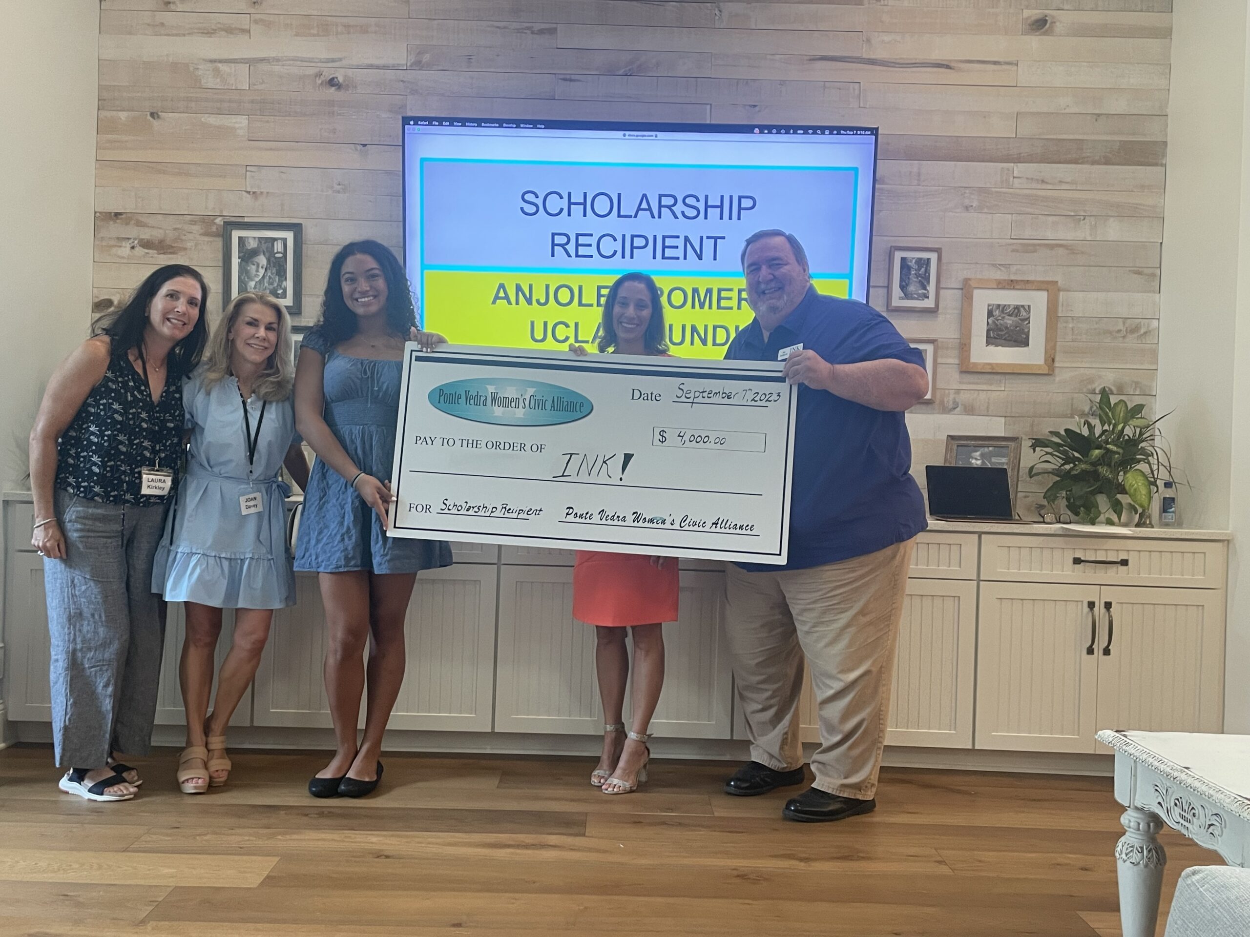 Ponte Vedra Women's Civic Alliance donates $4000 to INK! and Take Stock in Children - check presentation photo