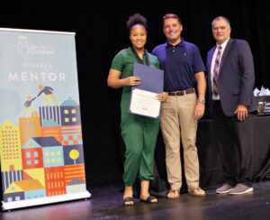 Take Stock graduate Braniya Woods with Chris Shee and Tim Forson. Braniya earned the Tim Forson Honors Scholarship and will attend FAMU.
